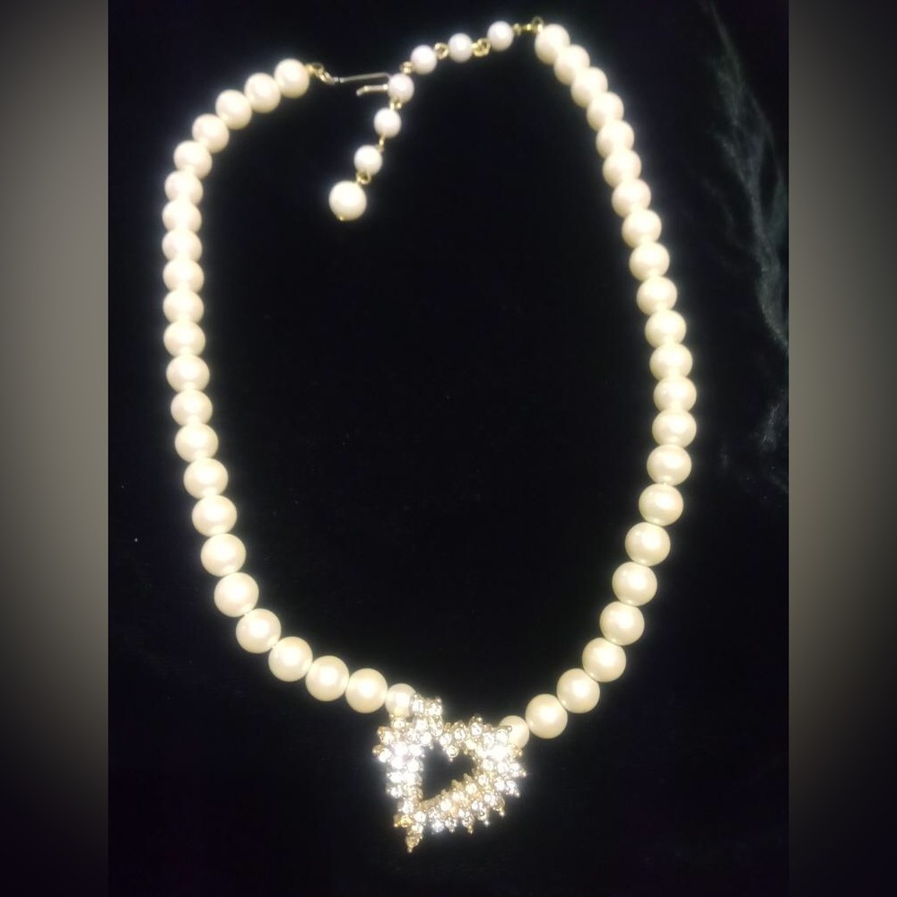 Faux pearl necklace with heart pendant